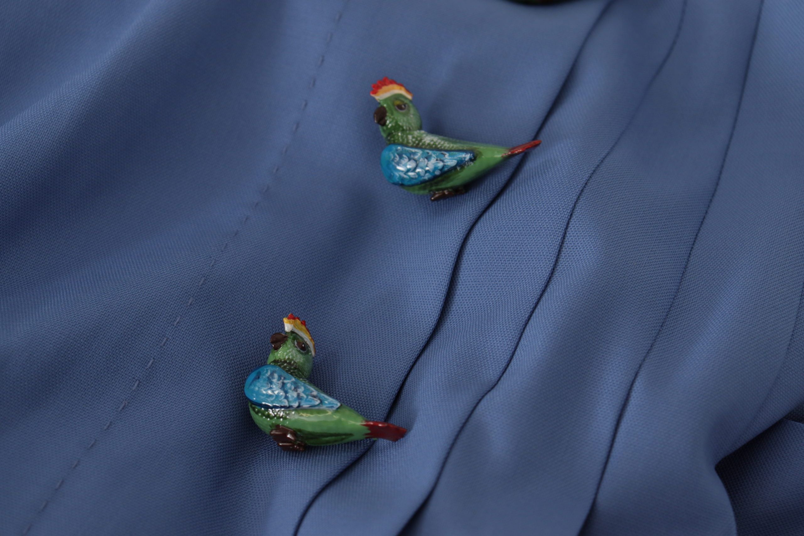 Елегантна плисирана мини пола с А-силует на Dolce & Gabbana с апликации с птици