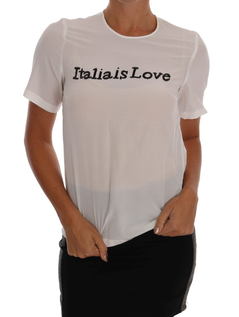Копринена бяла блуза Dolce & Gabbana с пайети „Italia Is Love“.
