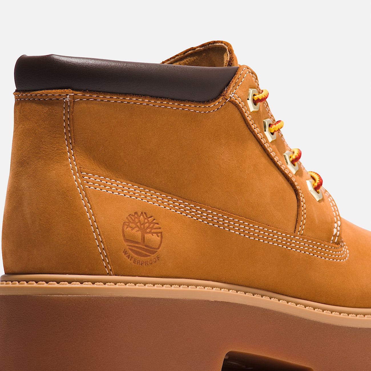 Дамски боти кубинки Women’s Stone Street Waterproof Platform Ankle Boots Timberland
TB1A5RF9231 Wheat Close up heel logo view