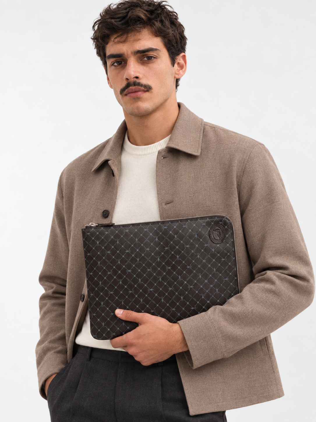Trussardi Men’s Monogram Leather Clutch
72B00042 2Y000083 K299 Black lifestyle view