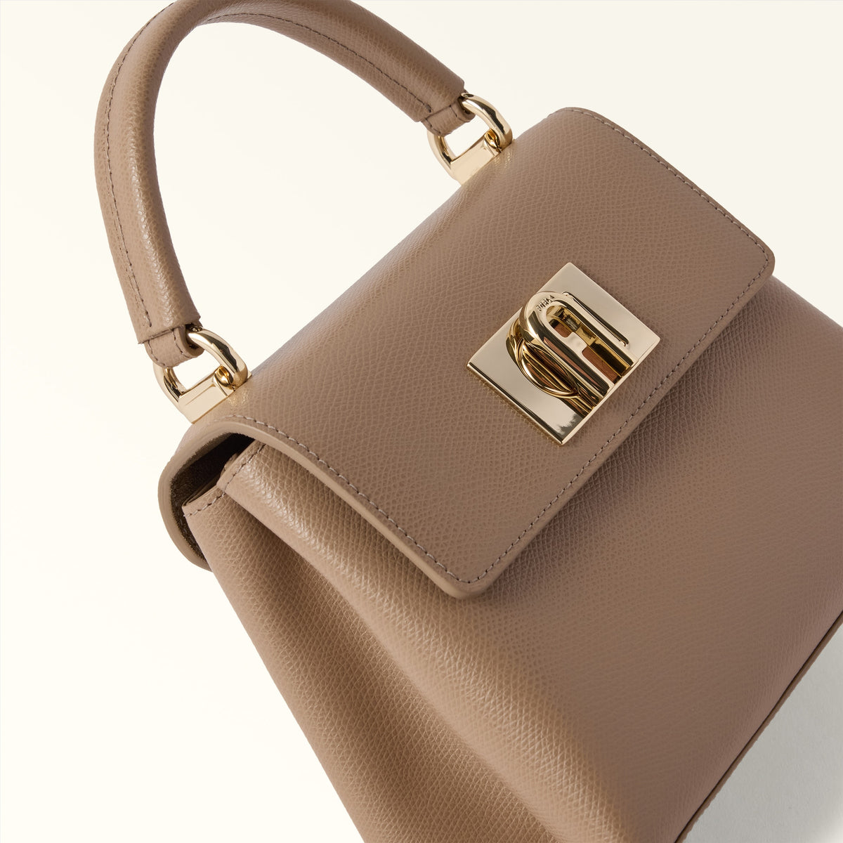 Women’s handbag Furla 1927 Top Handle Mini
WB00109_ARE000_1007_1257S Greige angled view