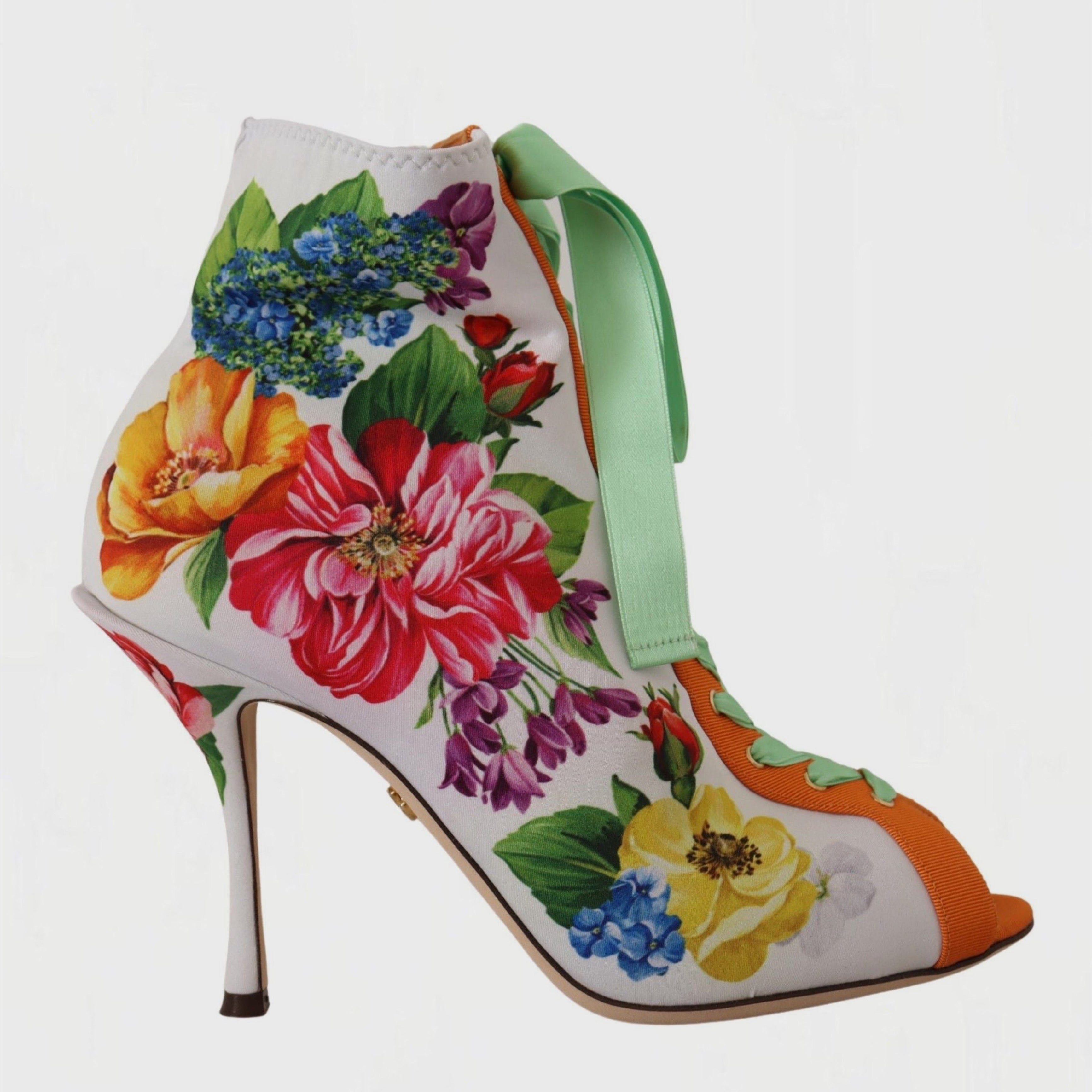 Дамски луксозни многоцветни обувки на висок ток с цветя DOLCE & GABBANA
Women’s Floral Open Toe Jersey Heels