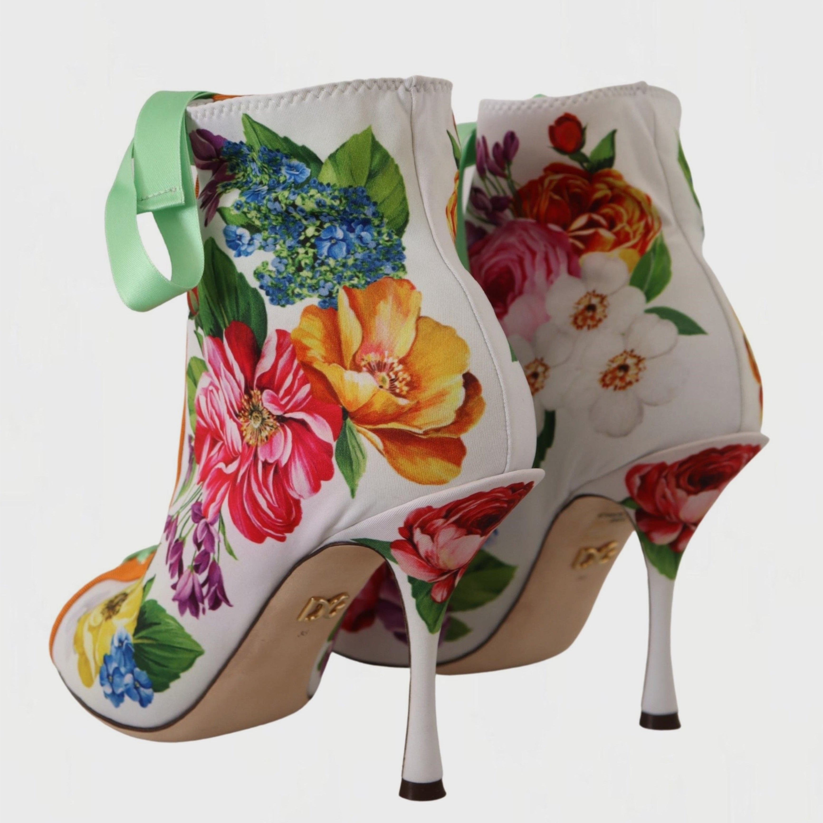 Дамски луксозни многоцветни обувки на висок ток с цветя DOLCE & GABBANA
Women’s Floral Open Toe Jersey Heels