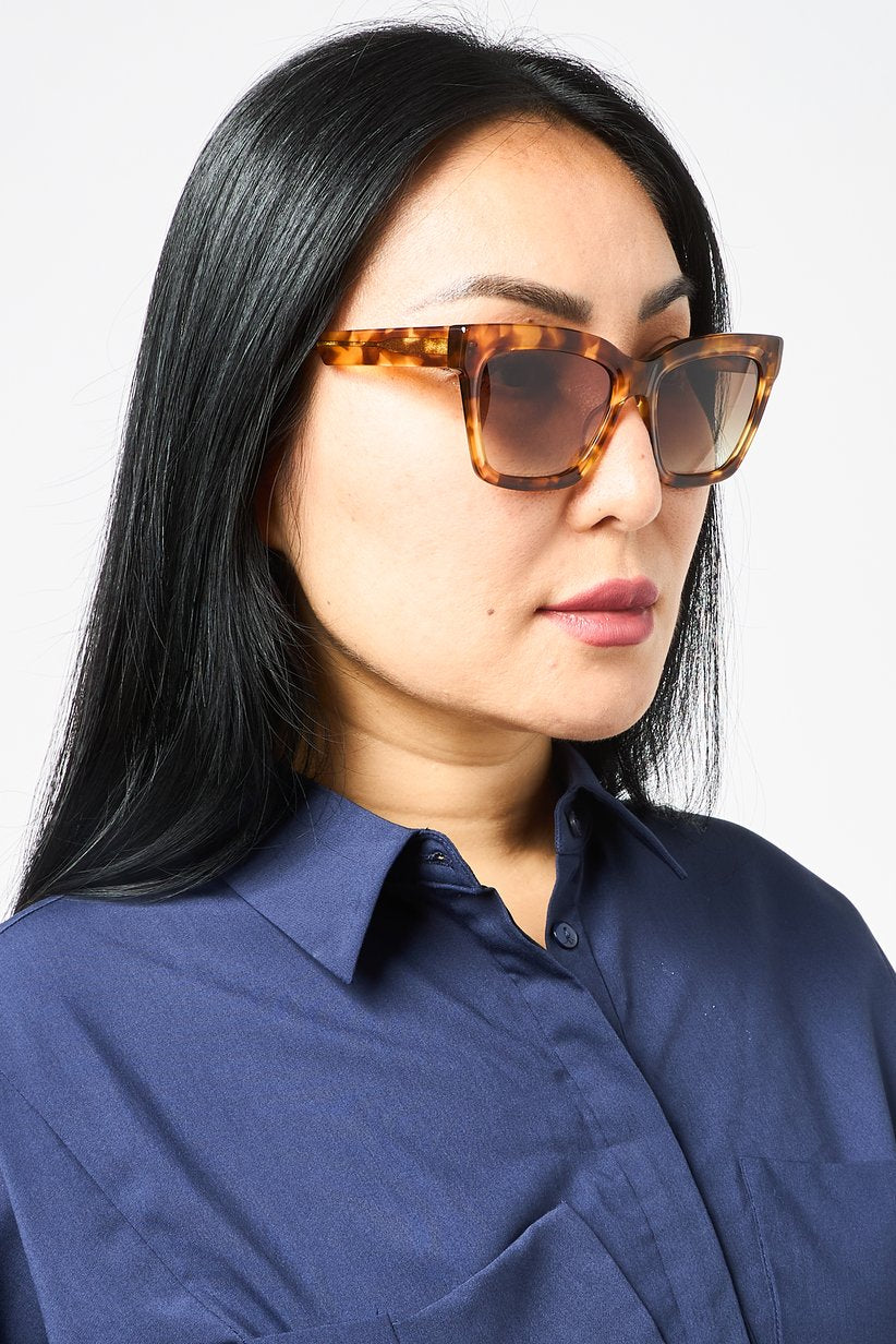 Дамски слънчеви очила Women’s sunglasses DKNY DK551S 243 Brown lifestyle view